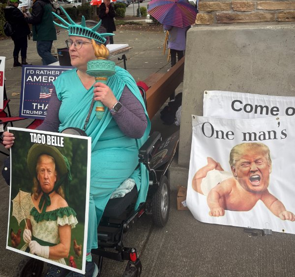 LADY LIBERTY seated with Taco Belle President poster